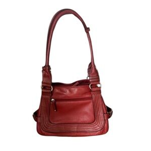 Tignanllo leather ladies tote. NWOT. Burgundy. Many inside compartments leather.